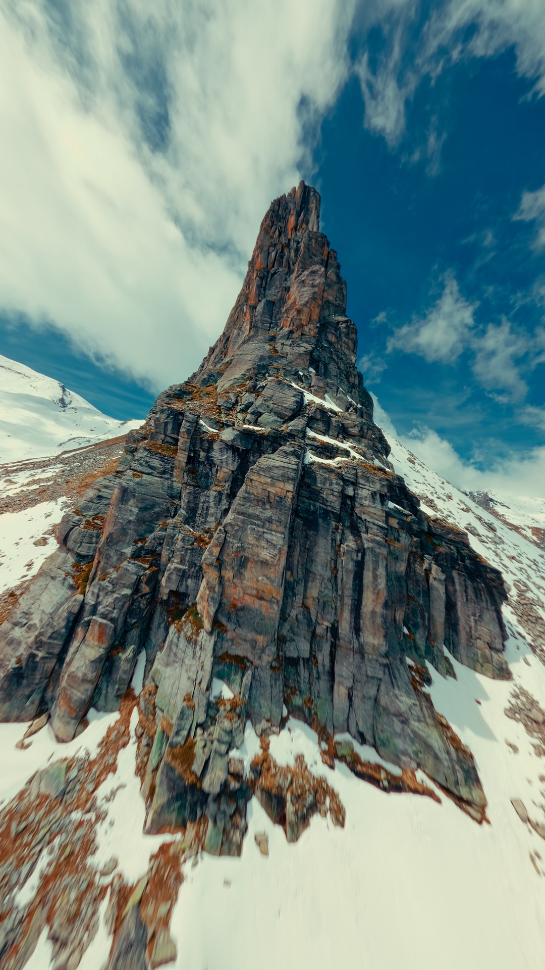 An aerial perspective of a rocky Alpine ridge